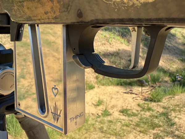 Engraved logo on the side of a rifle chassis